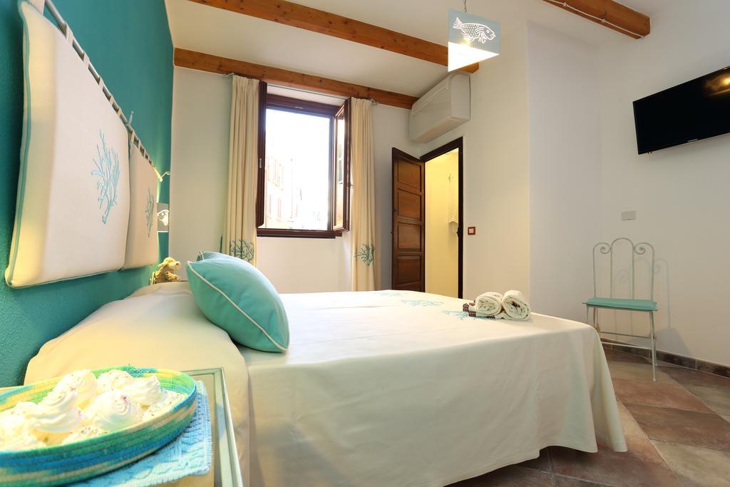Palau De Rosa Hotel Alghero Bagian luar foto